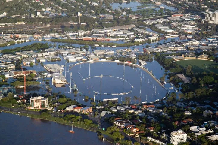 Fly over of flooded town.