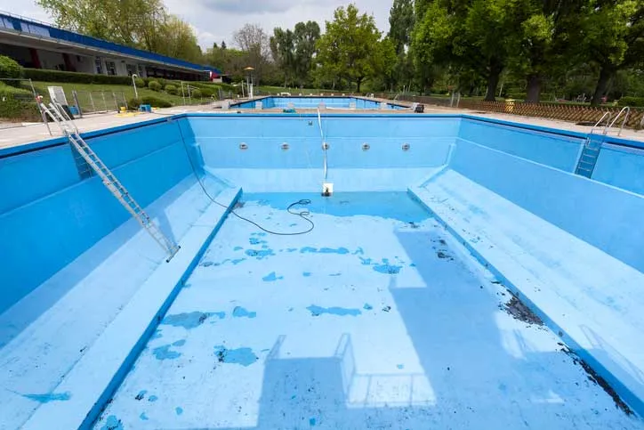 Large outdoor pool drained.