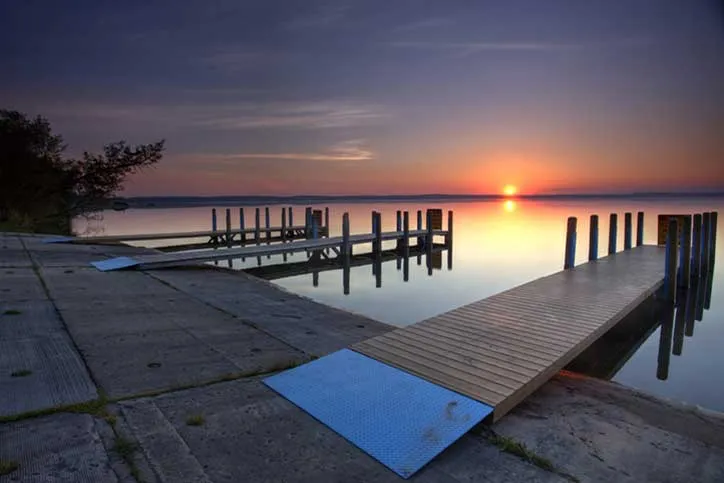 Sunset Over Boat Ramp on Lake