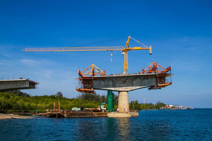 Bridge Under Construction with Cranes