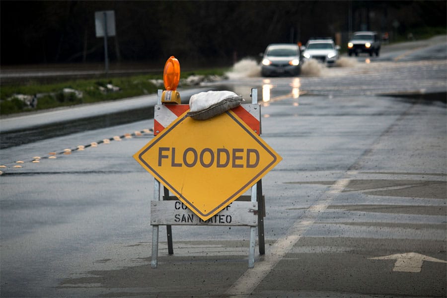 Flooded Sign on Road